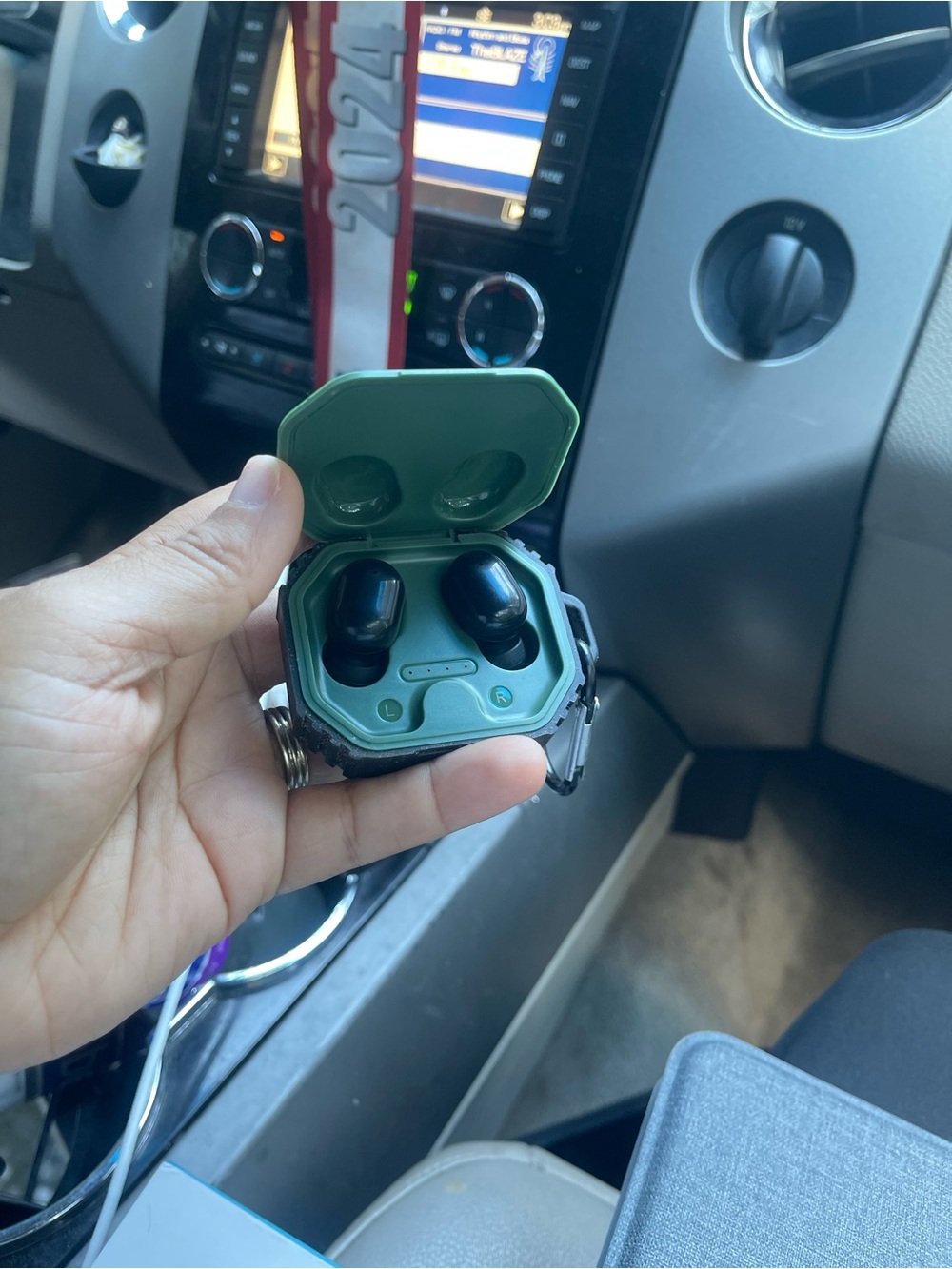 Wireless Earbud Headphones in Green - Compact Charging Case